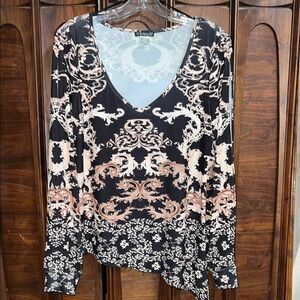 VENUS Black and White Asymmetrical Long Sleeve Blouse with slits in the sleeves.